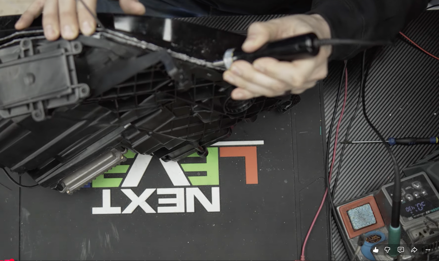 Cutting the Huracán headlight open with an ultrasonic cutter