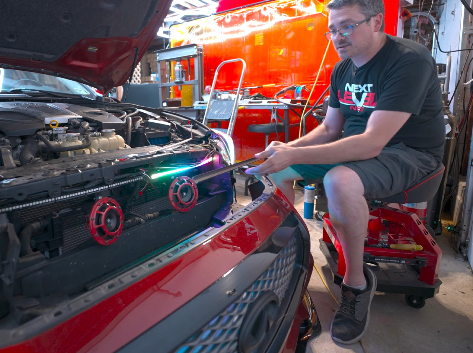 Installing the front end with the RGBW grille strip lit in a rainbow flow